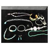 Assorted costume jewelry.