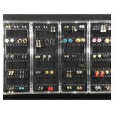 Folding display case with Earrings.