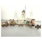 Christmas caravan wagon figurines.