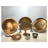 Copper and pewter candle holders and decor items.