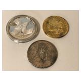 three silver coins