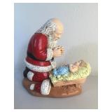 Christmas - Santa Kneeling At The Manger