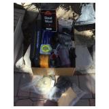 A box w/various items like a measuring tape and A box w/various items like a measuring tape and