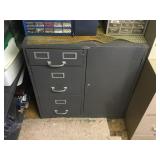 A file cabinet w/tools inside and a locked door