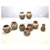 Collection of Native American Artist Signed Pots.