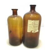 Two Large Vintage Brown Glass Bottles