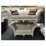 Pair on matching cream couch and love seat
