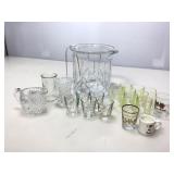 Collection of shot glasses and more.