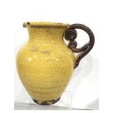 Glazed pottery pitcher.