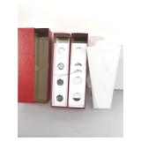 Boxes of empty Coin flips and display.