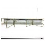 Mirrored brass display cabinet.