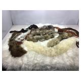 Assorted belts, collars shawls and more.