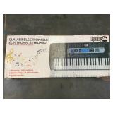 Rock Jam electronic keyboard in box