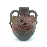 8 in tall pottery vase.