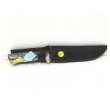 Deer design knife with sheath.
