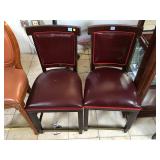 Pair of dark red dinning chairs