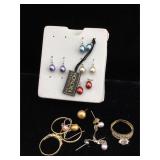 Lot of assorted costume jewelry , rings and more