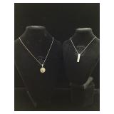 Two sterling necklace, one with bird pendant. 16