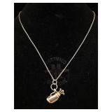 Sterling necklace with golf pendant. 17 in