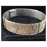Sterling bracelet with cactus and pyramid design.
