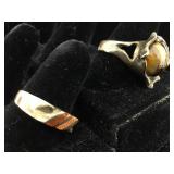 Two sterling rings sizes 8 1/4 and 7. One has