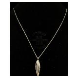 Sterling necklace with feather pendant. Approx 24