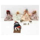 Vintage dolls and china boxer dogs.