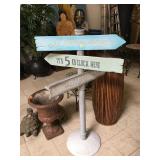 Decorative metal sign post signed Margarita Vile,