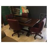 Conference table w/4 rolling chairs