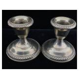 Two small empire sterling weighted candlesticks