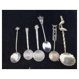 Six sterling souvenirs spoons