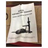 Manual portable tire changer in box.