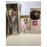 Collectible dolls in original boxes.