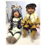 Pair of native style collectible dolls.