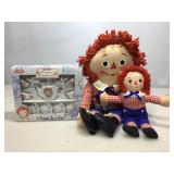 Raggedy ann and andy china set in box and dolls.
