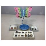 Butterfly jewelry holder with Costume jewelry.