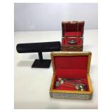 Jewelry boxes with contents.