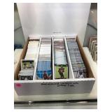 Unsorted mixed sports cards with stars & rookies