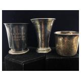 Three sterling cups