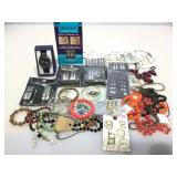 Costume jewelry. Assorted earrings and more.