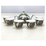 Mini tea set in fabric gift box.