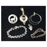Sterling chain bracelets, pin and pendants. TW