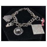 Sterling charm bracelet. 6 in, 23.4 g
