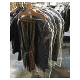 Assorted suits and ties, all different sizes