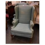 Two vintage wood frame blue chairs