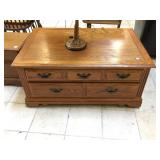 Wood coffee table with drawers