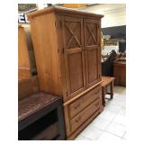 Solid wood armoire with doors and drawers. A