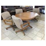 Dinning table with rolling chairs