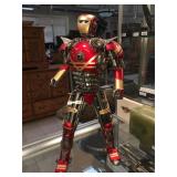 Metal Iron-Man figure made out of car parts,
