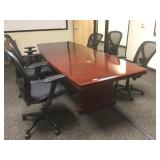 Confernce desk with chairs. Buyer to remove.